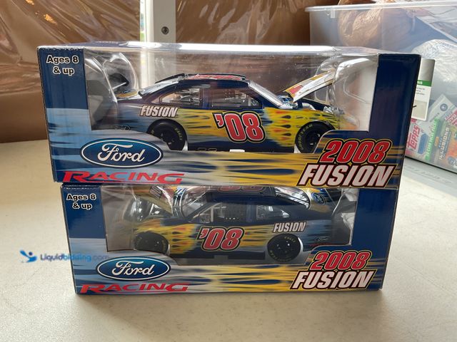 Lot 49-5350253 - LOT OF 2 FORD RACING 2008 FUSION 1/24 SCALE DIECAST CARS IN ORIGINAL BOXES