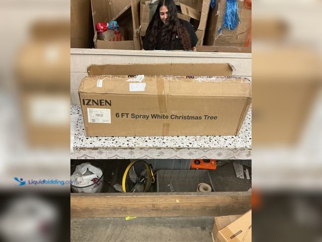 Lot 49-5462043 - Pre-lit Artificial Green Christmas Tree. Used slightly. Works.