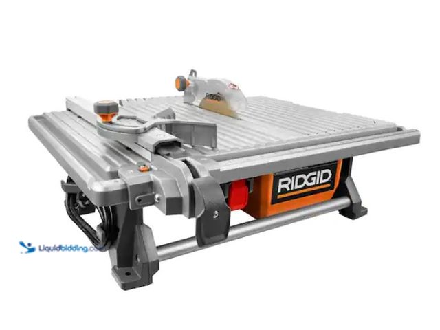 Lot 49-1578125 - RIDGID 6.5-Amp 7 in. Blade Corded Table Top Wet Tile Saw, Model # R4021, Slightly used, Works, Power...
