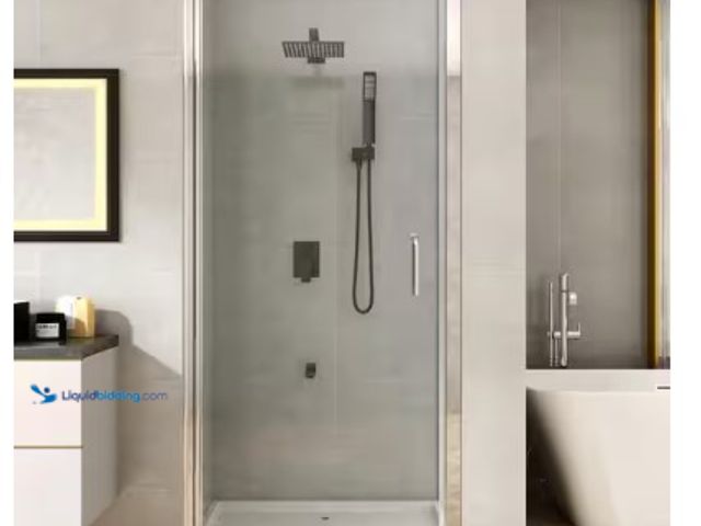 Lot 49-2004673 - TOOLKISS 30 to 31-1/4 in. W x 72 in. H Pivot Swing Frameless Shower Door in Chrome with Clear Glass,...