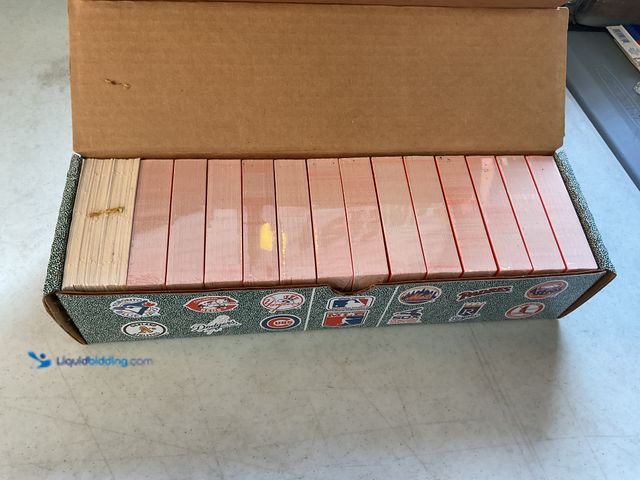 Lot 49-1505419 - COLLECTIBLE FACTORY SEALED BRICKS 1990 DONRUSS BASEBALL COMPLETE 660 CARD SET INCLUDING STARS AND HA...