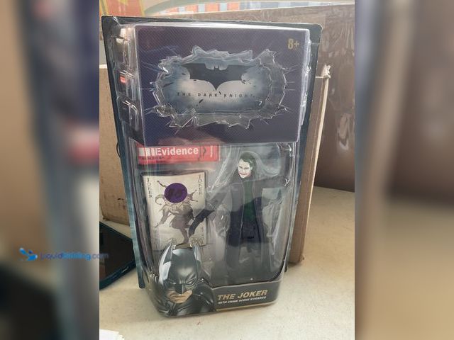 Lot 49-2009019 - Other THE DARK KNIGHT BATMAN “THE JOKER” ACTION FIGURE NEW IN PACKAGE