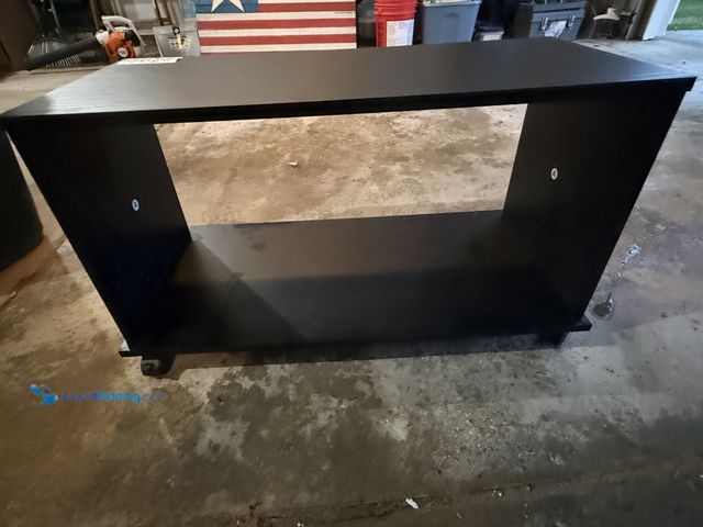 Lot 49-1911395 - TV Stand Black Wood TV Stand Rolling TV Stand - Gently Used