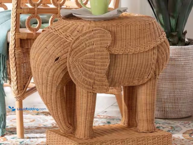Lot 49-1570381 - bali & pari Elissa 26.8 in. Light Honey Specialty Elephant Rattan Wicker End Table, Model # 256-1414...