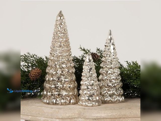 Lot 49-1540828 - Creative Co-op Glass Set of Nine Various Sized Light Up GoldFigurine Christmas Trees,  Model # B0BN4...