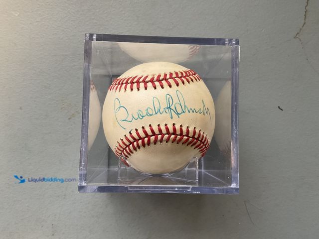 Lot 49-1830598 - COLLECTIBLE AMAZING AUTOGRAPHED BASEBALL BY BROOKS ROBINSON AMAZING SIGNATURE CERTIFIED BY SGC AMAZI...