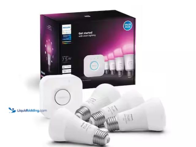 Lot 49-1631307 - Philips Hue 75-Watt Equivalent A19 Smart LED Color Changing Light Bulb Starter Kit (4 Bulbs and Brid...