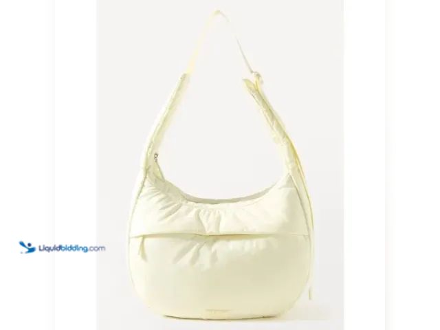 Lot 49-5415139 - Athleta All About Medium Crossbody Hobo Bag Glow Yellow. Model #599409042. New.