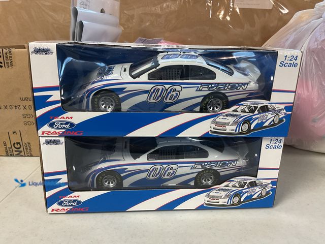 Lot 49-5341588 - LOT OF 2 FORD RACING 2006 FUSION 1/24 SCALE DIECAST CARS IN ORIGINAL BOXES