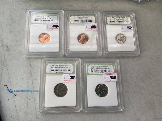 Lot 49-1505740 - LOT OF 5 INTERNATIONAL NUMISMATIC BUREAU INCAPSULATED COINS INCLUDING PENNIES, DIMES AND NICKELS. SO...