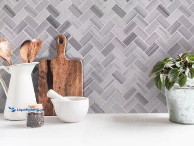 Lot 49-2025582 - Approx. (10) sq. ft. of MSI Bergamo Herringbone 12 in. x 12 in. x 10 mm Polished Marble Mesh-Mounted...