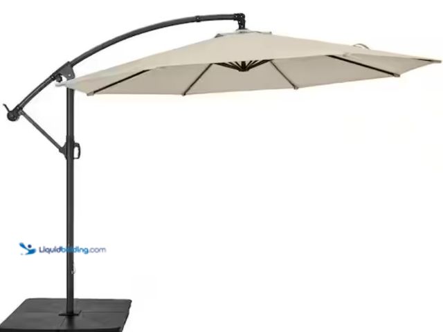 Lot 49-2005993 - StyleWell 10 ft. Steel Cantilever Market Patio Umbrella in Putty, Model # IT20597A-S-SE, Unused, Has...