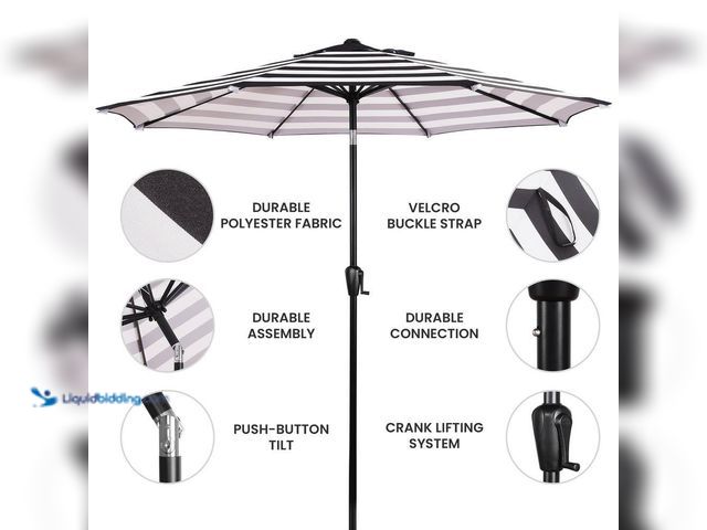Lot 49-5552071 - Sun-Ray
9 ft. Round 8-Rib Steel Market Patio Umbrella in Black and White Stripe. Model # 201006BW. ...
