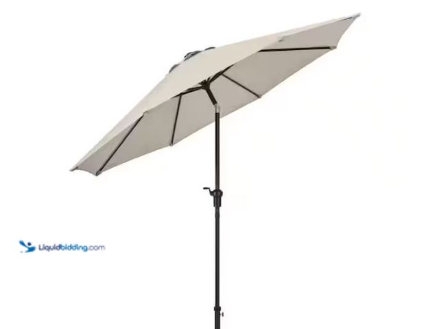 Lot 49-1624767 - Hampton Bay 9 ft. Aluminum Market Crank and Auto-Tilt Patio Umbrella in Putty Beige Model # UCM19000...