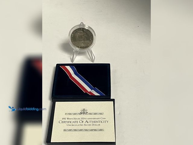 Lot 49-910563 - Official 1992 White House 200th Anniversary Uncirculated Silver Dollar issued by the United States M...