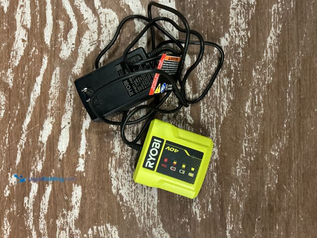 Lot 49-5572026 - RYOBI 40V Lithium-Ion Charger with USB Port. Model # OP4011A./ unused