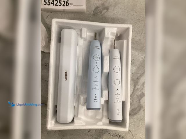 Lot 49-5542526 - Philips Toothbrush with 2 Handles, 4 Brush Heads, 2 Chargers, 1 Charging Travel Case, Unused with at...