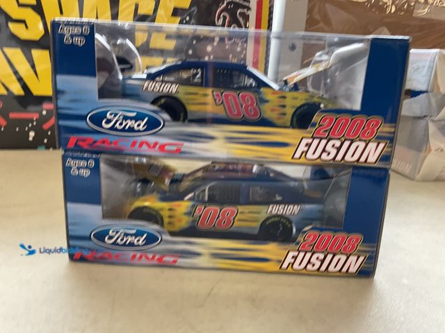 Lot 49-1505481 - COLLECTIBLE LOT OF 2 FORD RACING 2008 FUSION 1/24 SCALE DIECAST CARS IN ORIGINAL BOXES #COINS0122