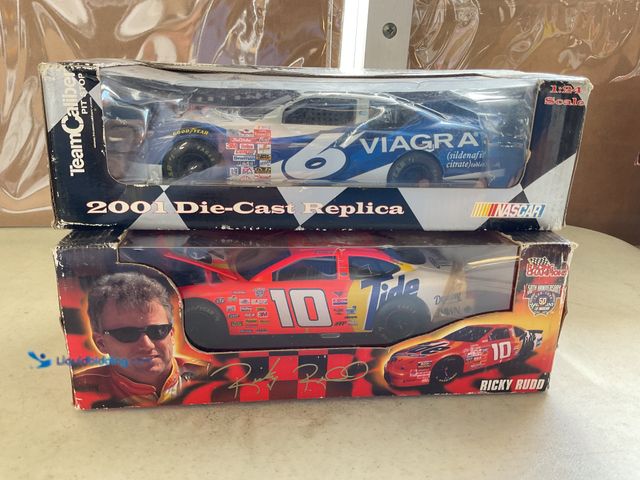 Lot 49-1830766 - COLLECTIBLE LOT OF 2 1/24 SCALE DIECAST CARS IN ORIGINAL BOXES INCLUDING #6 VIAGRA AND #10 RICKY RUD...