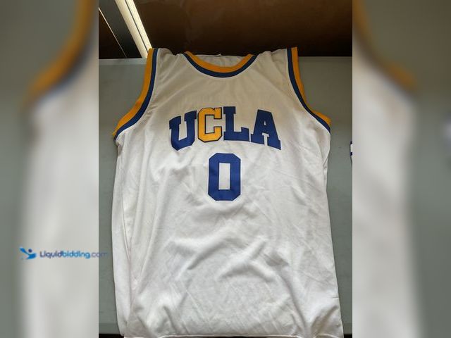 Lot 49-1977237 - Other WOW AWESOME COLLEGE UCLA RUSSEL WESTBROOK BASKETBALL JERSEY SIZE LARGE AN AMAZING JERSEY FOR A...