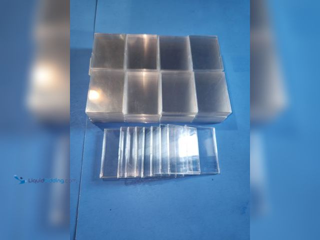 Lot 49-1817796 - 90- SNAP TIGHT SPORTS CARD CASES. VERY LIGHTLY USED! SPORTS CARDS LOOK GREAT IN THEM AND ARE PROTECT...