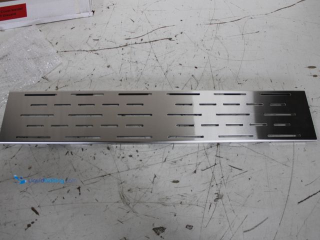 Lot 49-3631157 - 25 1/8 x 4 5/8" Stainless Steel Drain Cover, NOTE: Scuffs/Scratches, Shipping Damage.   Ref#BIN0730