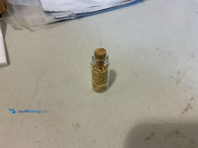 Lot 49-5515683 - RARE ONE INCH GLASS VILE OF PURE 24K GOLD FLAKES
