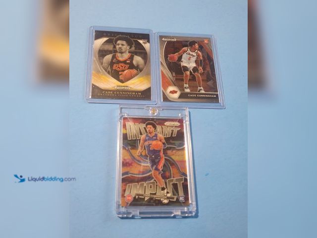 Lot 49-1817773 - 3- COLLECTIBLE CADE CUNNINGHAM ROOKIE BASKETBALL CARDS. ALL ARE PRIZM PRODUCTS AND ALL CARDS ARE IN ...