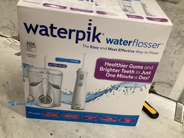 Lot 49-5542681 - Waterpik Ultra Plus and Cordless Pearl Water Flosser Combo Pack Unused