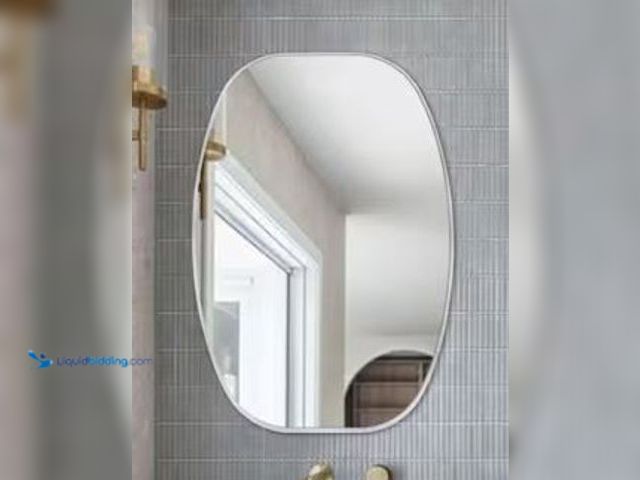 Lot 49-1627016 - Sxiawe 24 in. W x 36 in. H Silver Oval Wall Mounted Aluminum Alloy Bathroom Mirror Decorative Mirror...