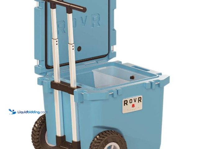 Lot 49-5552622 - RovR RollR 45 Qt. Wheeled Hard Cooler, South Pacific. Model #R-R45-SP. Unused with scuffs. Dirty fro...