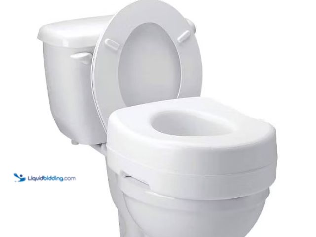 Lot 49-5453685 - Carex Raised Toilet Seat with Rubber Pads - White. [Model: 023601131003] Unused