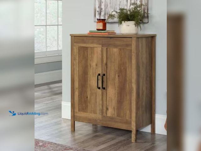 Lot 49-5574248 - SAUDER
Select Rural Pine Finish 38 in. Storage Cabinet with Adjustable Shelves. Model # 443664. Unu...