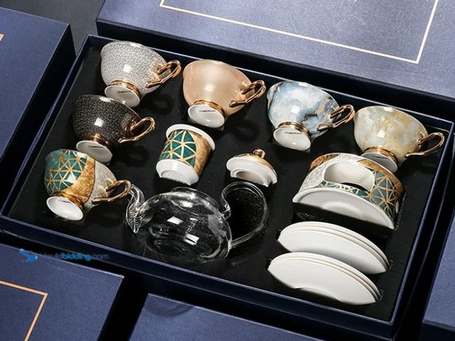 Lot 49-5552266 - Meidao Chinese Herbal Tea Set - 6 Person Floral Teapot & Candle Warmer. Product Code: 685926320203. ...