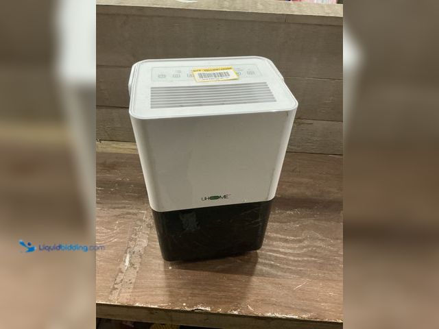 Lot 49-5463484 - Dehumidifier. Item is PARTS AND REPAIRS, One wheel broken