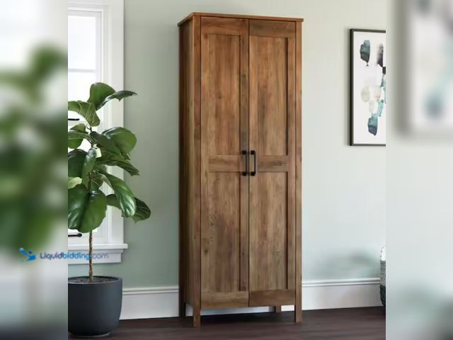 Lot 49-1623686 - SAUDER Rural Pine 2-Door Storage Cabinet with Panel Doors, Model # 427958, Slightly used, Scuffs/Scr...