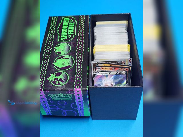 Lot 49-1988927 - BOX OF 300+ COLLECTIBLE POKEMON GAMING CARDS.