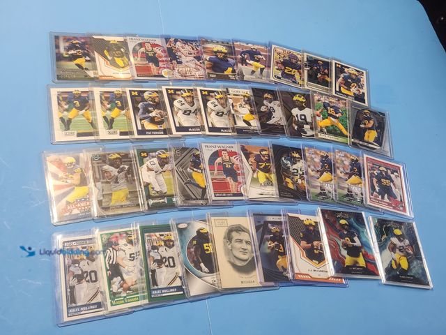 Lot 49-1817762 - 38- COLLECTIBLE UNIVERSITY OF MICHIGAN SPORTS CARDS. MOSTLY FOOTBALL AND INCLUDES JJ MCCARTHY BLAKE ...