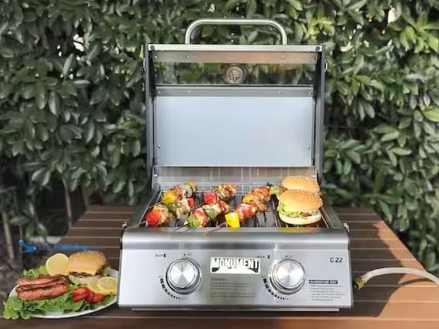 Lot 49-1623900 - Monument Grills Portable Tabletop Propane Gas Grill in Stainless Steel with Clearview Lid (2-Burner)...
