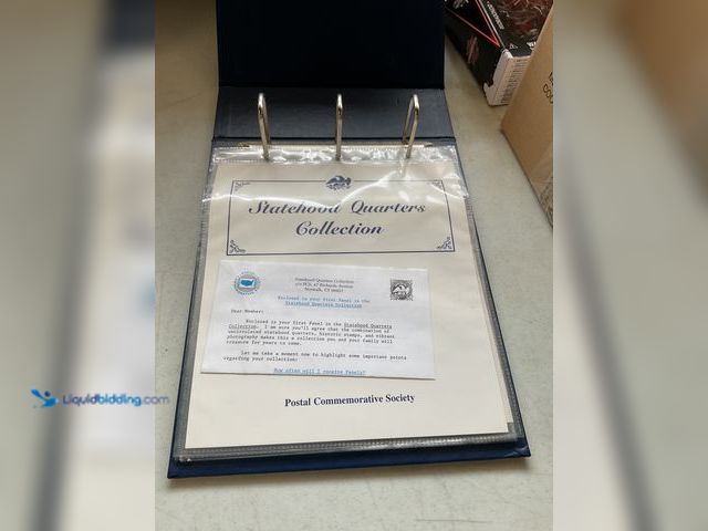 Lot 49-5350285 - STATEHOOD QUARTERS COLLECTION BINDER WITH 5 SETS INCLUDING ILLINOIS, MAINE AND MORE
