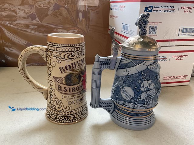 Lot 49-3503981 - LOT OF 2 COLLECTIBLE BEER STEIN MUGS NO BOXES INCLUDING CONQUEST OF SPACE AND STROH’S BREWING DETROI...