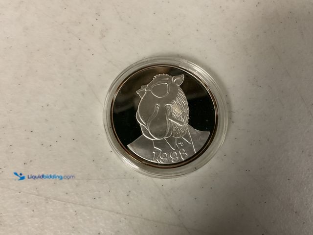Lot 49-1811328 - CAMEL CIGARETTES 1993 EDITION ONE TROY OZ .999 FINE SILVER COIN