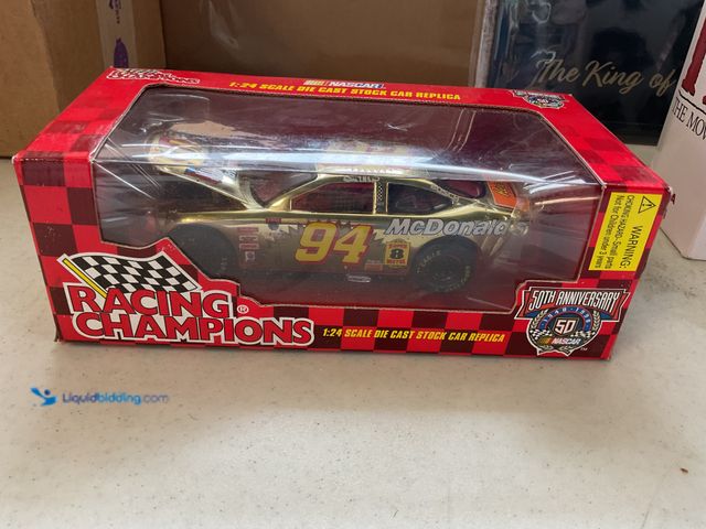 Lot 49-5341506 - RACING CHAMPIONS #94 BILL ELLIOTT MCDONALDS  1/24 SCALE DIECAST CAR IN ORIGINAL BOX