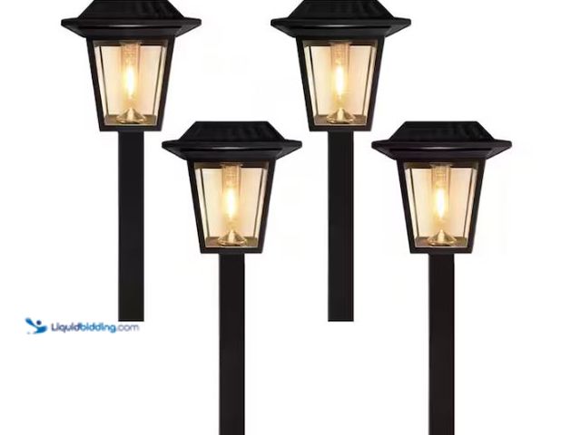 Lot 49-1627505 - Monteaux Lighting Black Integrated LED Outdoor Solar Pathway Lights with Clear Glass (4-Pack) Model ...