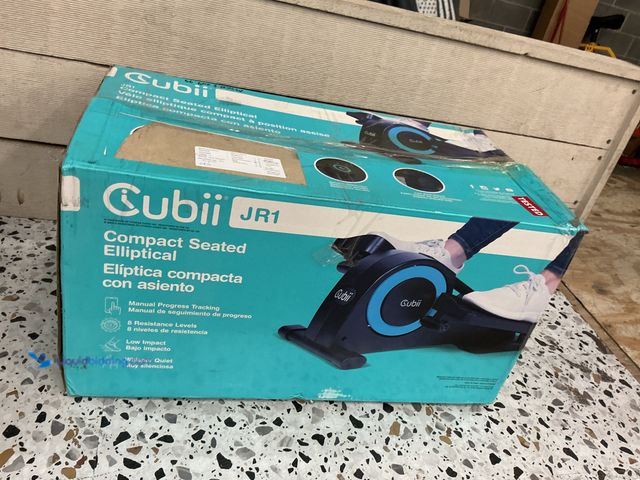 Lot 49-3531339 - Cubii Jr F3a2 Under Desk Elliptical. Model #0861062000243. Slightly used with attachments. Powers on...
