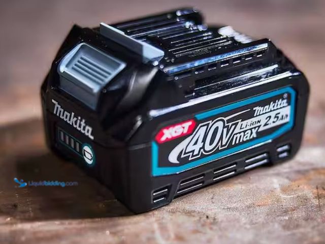 Lot 49-3614821 - Lot of (1) Makita 40V max XGT® Brushless Cordless 1/2" Hammer Driver‑Drill, Model # GPH01Z, and (1) ...