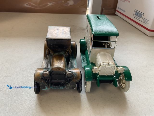 Lot 49-5350262 - LOT OF 2 VINTAGE METAL DIECAST CAR BANKS NO ORIGINAL BOXES