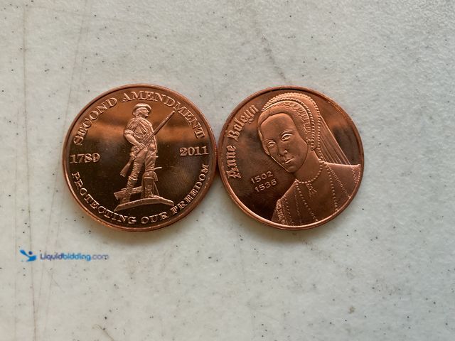 Lot 49-1804559 - 2 COLLECTIBLE FACE ONE ADVP OZ COPPER COINS