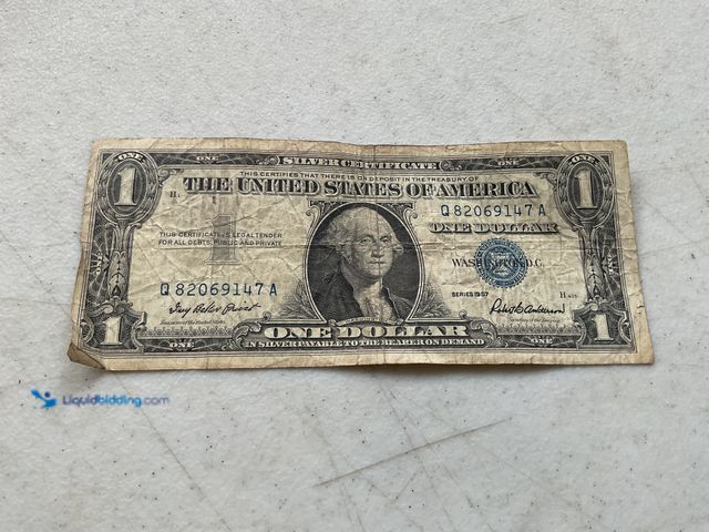 Lot 49-5350280 - 1957 BLUE SEAL UNITED STATES ONE DOLLAR SILVER CERTIFICATE