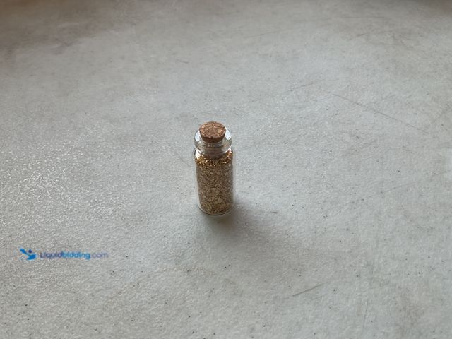 Lot 49-5467724 - NEW ONE INCH GLASS VILE OF PURE 24K GOLD FLAKES